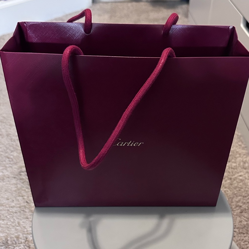 Cartier Deep Red jewelry bag.